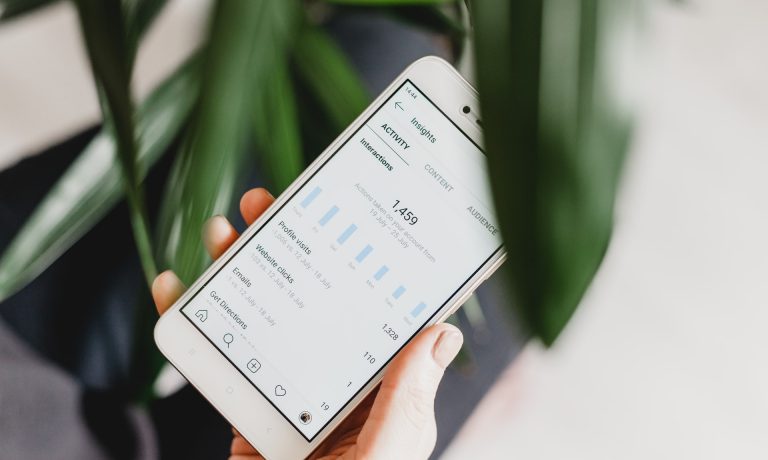 Phone showing Instagram analytics